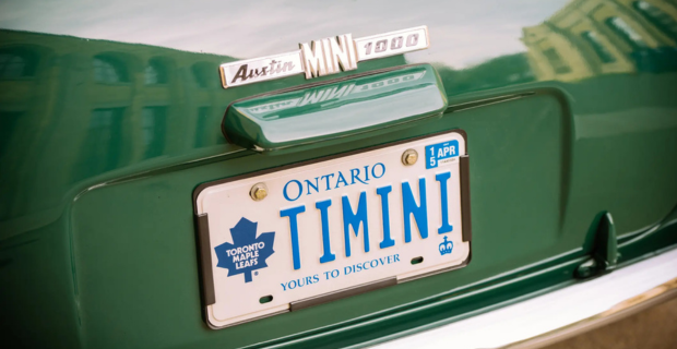 Close-up view of an Ontario license plate on a collector car.