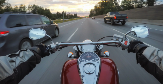 Riding a motorcycle during a vibrant sunset. Taken in Surrey, Greater Vancouver, British Columbia, Canada.